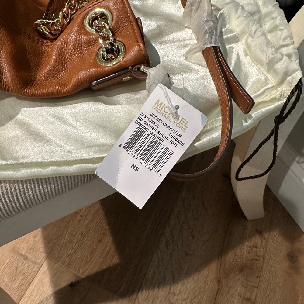 Michael Kors purse, received as a gift and never used.